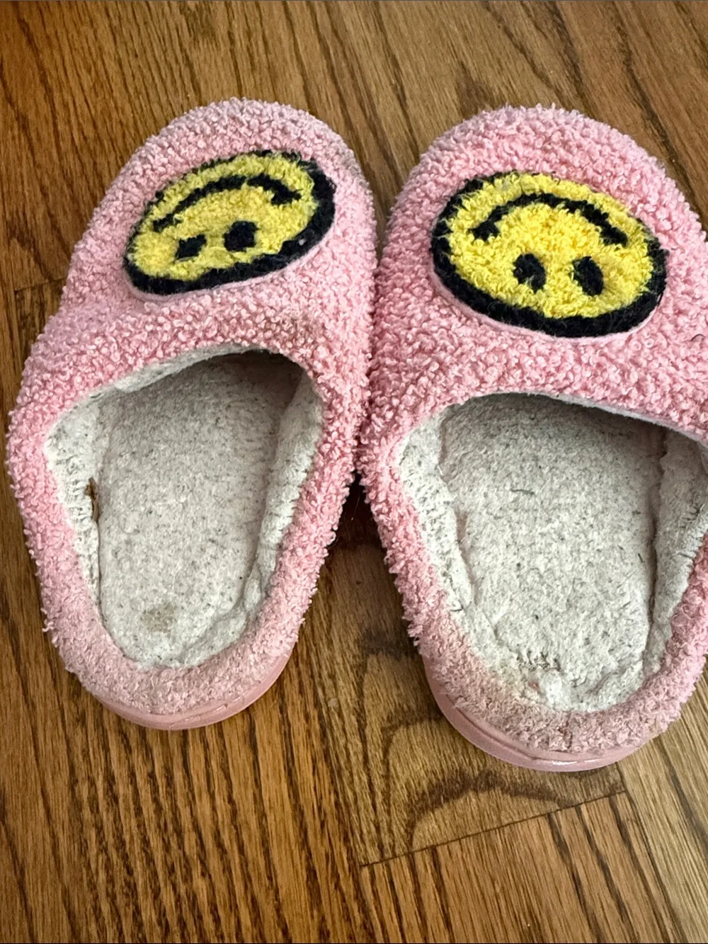 Pink Fuzzy Slip-On Slippers with Yellow Smiley Faces